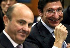De Guindos y Goirgolzarri celebraron los rescates bancarios, aunque aún tendrán que soportar muchos 'palos en las ruedas' en el camino de la depuración de Bankia.