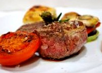 Atún rojo de almadraba y ternera de Retinto, protagonistas del restaurante Café Royalty