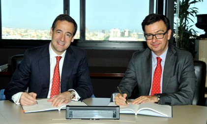 Gonzalo Gortázar, consejero delegado de CaixaBank y Román Escolano, vicepresidente del BEI.