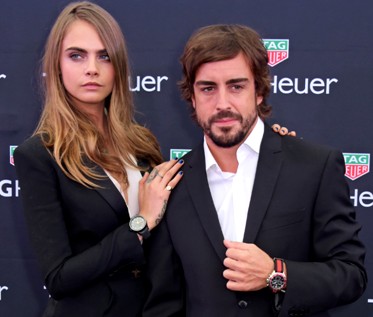 Cara Develingne y Fernando Alonso.