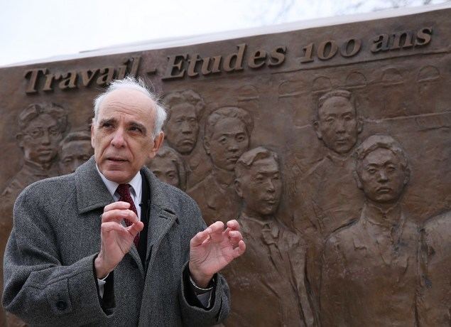 Jean-Louis Rizzo, a retired history professor from Paris Institute of Political Studies, receives an interview with Xinhua at Deng Xiaoping Square in front of the railway station of Montargis, France, March 22, 2021. (Xinhua/Gao Jing)